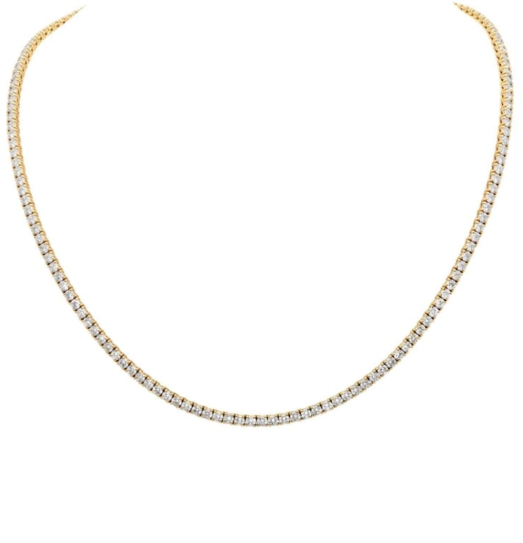 14k Yellow Gold 12.45ct Diamond Necklace: 14k Yellow Gold 12.45ct Diamond Necklace – V48645 SKU: 48645 Radiant and commanding, this 14k yellow gold necklace is adorned with 161 round brilliant diamonds totaling 12.45 carats. Graded F–G in