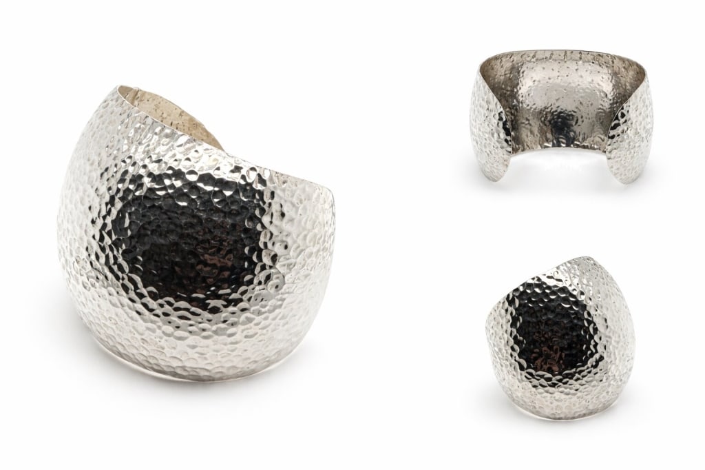 Vintage 925 Sterling Silver Hammered Cuff Bracelet: Vintage .925 sterling silver hammered finish dimple texture cuff bracelet. Stamped '925 Mexico towards end of cuff on inside. Minor signs of age/use, otherwise in very good condition. Weight: 63g