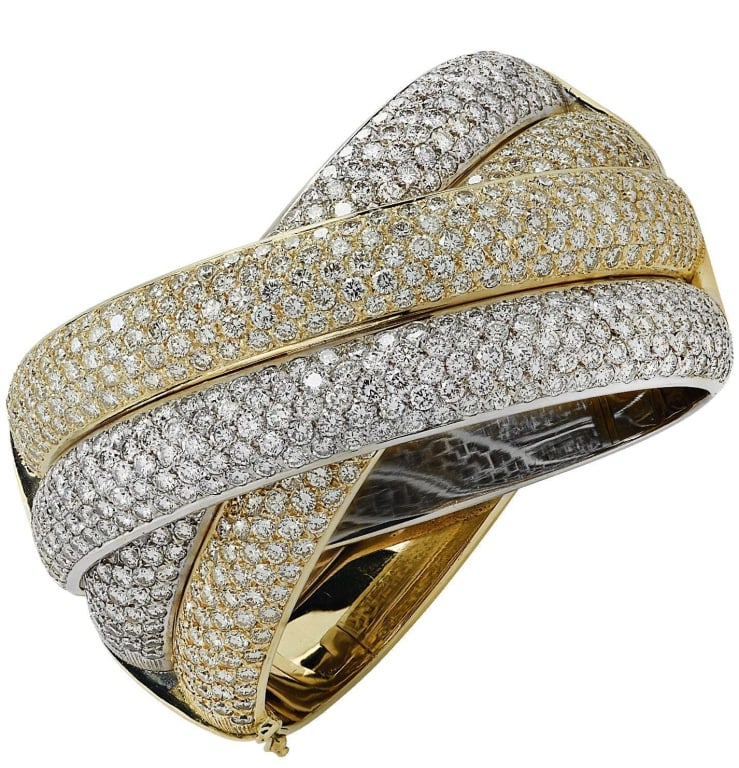 31 Carat Diamond X Bangle Bracelet: 31 Carat Diamond X Bangle Bracelet in 18K Yellow & White Gold, Handmade in Italy SKU: 38302 Indulge in the exquisite elegance of the 31 Carat Diamond Italian X Bangle Bracelet, a stunning piece that