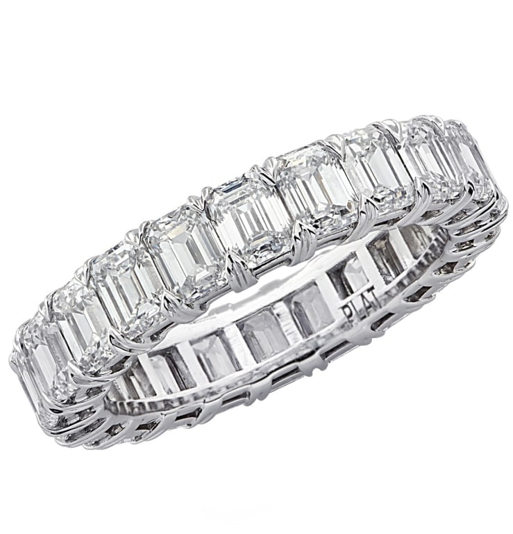 5.12 Carat Platinum Eternity Band: 5.12 Carat Platinum Eternity Band with 22 GIA Certified Emerald Cut Diamonds SKU: 27666 Indulge in the timeless elegance of the 5.12 Carat Eternity Band. Expertly handcrafted in luxurious platinum,