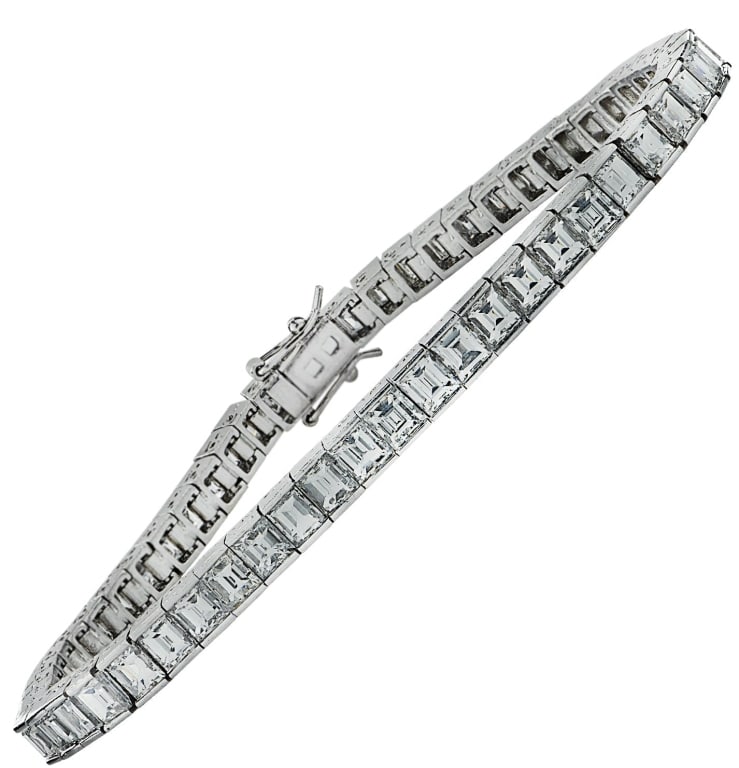 Mid Century 12.02ct Diamond Tennis Bracelet: Mid Century 12.02ct Carre' Cut Diamond Tennis Bracelet in Platinum SKU: 41911 Discover the elegance of the Mid Century 12.02 Carat Carre' Cut Diamond Tennis Bracelet, an exquisite piece of jewelry