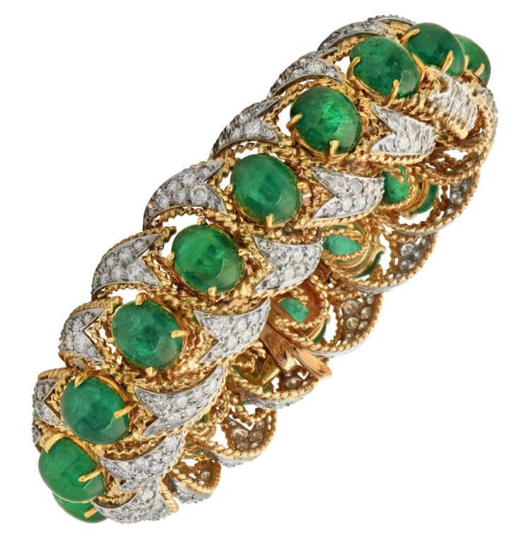 50 Carat Emerald and Diamond Bracelet in 18k Gold: 50 Carat Emerald and Diamond Bracelet in 18k White and Yellow Gold - V49396 SKU: 49396 Discover the epitome of luxury with our stunning 50 Carat Emerald and Diamond Bracelet. This exquisite piece