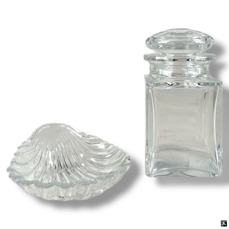 Baccarat Crystal Canister and Shell Dish: Baccarat Crystal Apothecry Canister and Shell Trinket Dish. Both signed. Tiny fleabite on corner of canister, no chips or cracks on shell dish. Canister measures 6" H. 31562 1A