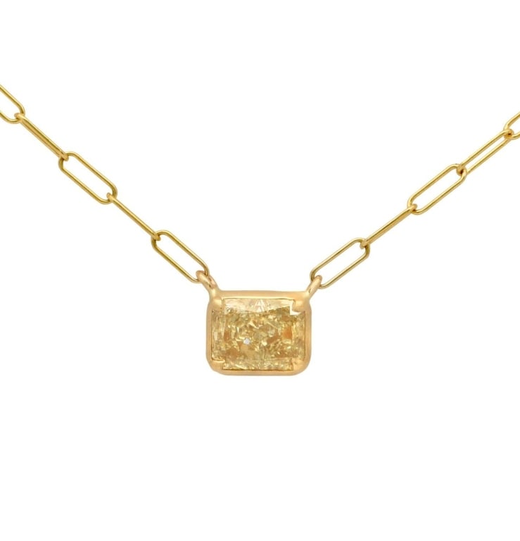14K Yellow Gold with 1ct Light Yellow Diamond: 14K Yellow Gold with 1ct Light Yellow Diamond V-50805 SKU: 5080 A modern take on timeless elegance, this 14k yellow gold necklace highlights a radiant-cut 1 carat diamond in a soft light yellow hue.