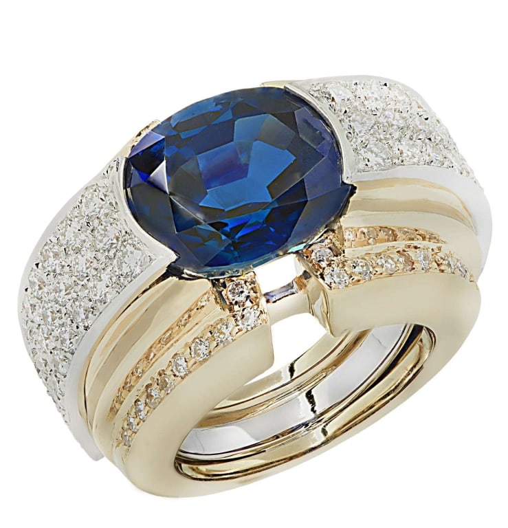 David Webb 10.20 Carat Sapphire Ring: David Webb 10.20 Carat Sapphire Ring With 2.00 Carats Diamonds In Platinum & 18K Yellow Gold SKU: 46596 This stunning David Webb Sapphire & Diamond Ring is a true embodiment of luxury and
