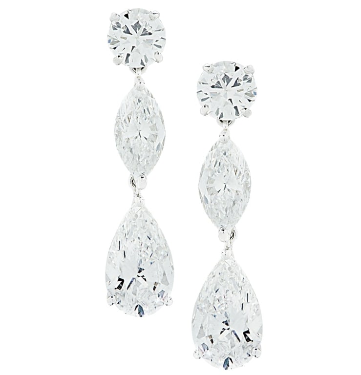 Cartier GIA Certified 5.66 Carat Diamon Earrings: Cartier GIA Certified 5.66 Carat Diamond Dangle Earrings in Platinum - V45490 SKU: 45490 Experience the elegance of Cartier with the GIA Certified 5.66 Carat Diamond Dangle Earrings – V45490. These