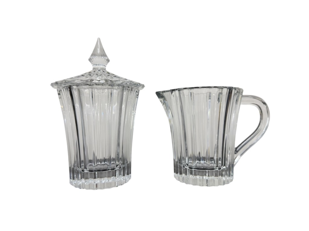 Baccarat Mille Nuits Creamer and Covered Sugar Set: Baccarat Mille Nuits Creamer and Covered Sugar Crystal Set in box. Designed by Mathias. Both pieces stamped on bottom. Very good condition. 2A