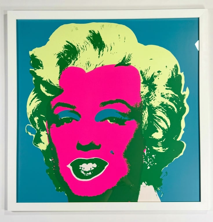 After: Andy Warhol (1928-1987) Serigraph: Andy Warhol, American (1928-1987) serigraph "Marilyn Monroe" produced by Sunday B. Morning. Stamped verso. Well framed and in good condition. Measures 39" x 38 1/2" 16A