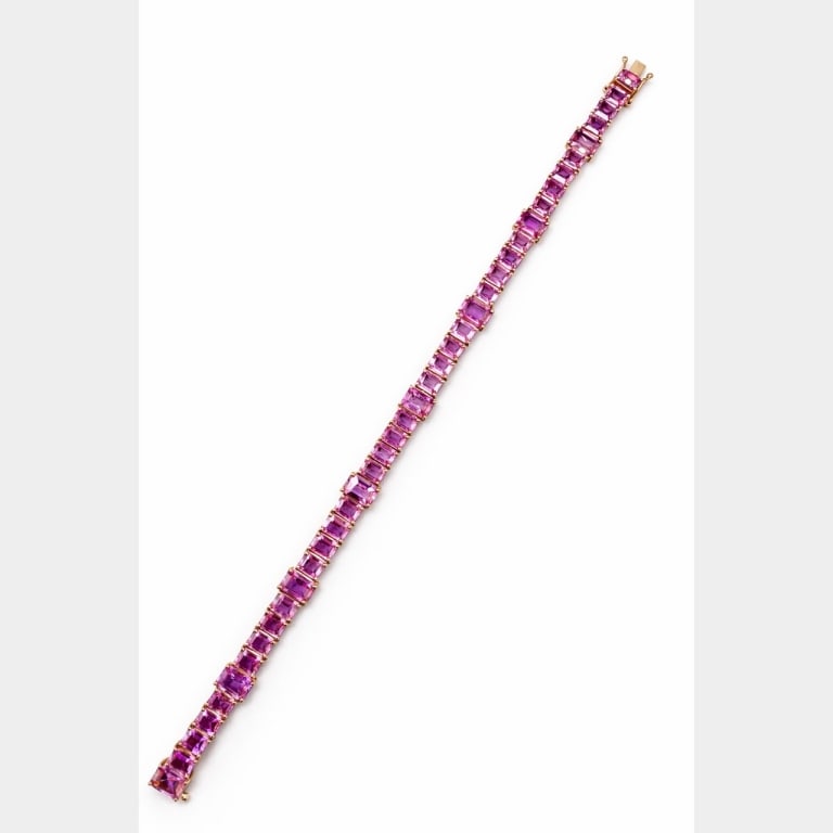 18K Yellow Gold Pink Sapphire Bracelet: 18K Yellow Gold 26.00 Ct. GIA Certified Pink Sapphire Bracelet Item # 13788 Category Bracelets 18K Yellow Gold 26.00 Ct. GIA Certified Pink Sapphire Bracelet Weighing 19.1 grams Set with 40 Pink Sapph