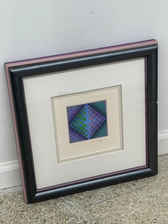 Victor Vasarely (1906-1997) Signed Lithograph: Victor Vasarely (1906-1997) Signed Lithograph "Remek (Marvel)" c.1989. Signed lower right and numbered 141/175 lower left. Well framed, matted and in good condition. Measures 16 1/4" x 15 3/4" 19B