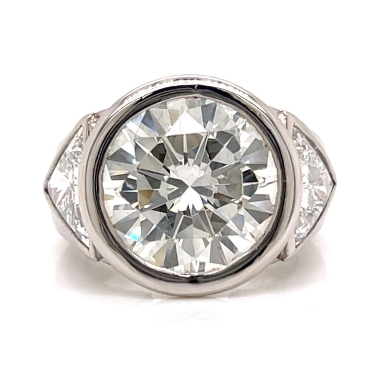 BOODLES Platinum 6.37 Ct. Diamond Ring: BOODLES Platinum 6.37 Ct. Diamond Ring Item # 13537 Category Rings BOODLES Platinum 6.37 Ct. Diamond Ring Weighing 22.9 grams Set with a 6.37 Ct. Diamond in center I-J Color, VVS Clarity Along with 2 