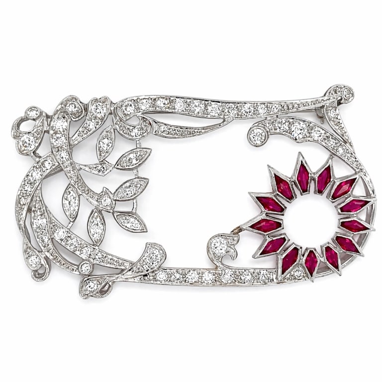 Art Deco Platinum Ruby & Diamond Brooch: Item # 13929 Category Pins - Clips Art Deco Platinum Ruby & Diamond Brooch Weighing 16.7 grams Set with app. 2.50 Ct. of Diamonds G-I Color, VVS-VS Clarity Along with 13 Rubies weighing app. 1.50 Ct.