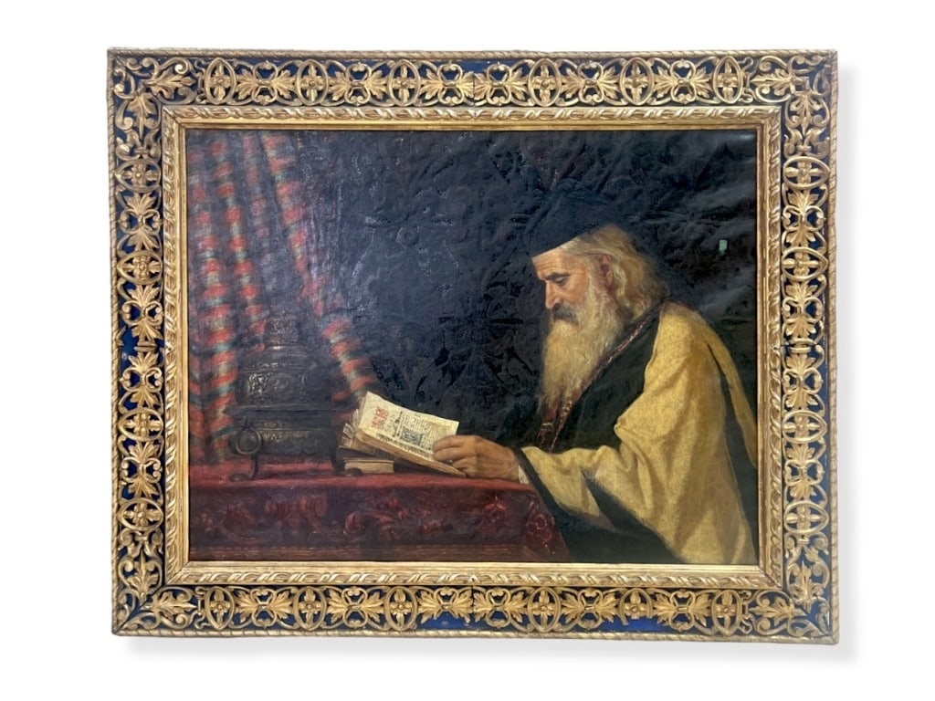 Artist Unknown 19th Century Oil on Canvas Portrait: Portrait of a prominent Greek Orthodox Priest, seated by the desk reading out from an opened Latin script illuminated manuscript bible. 19th century, circa 1850s. Well framed. Some signs of age,