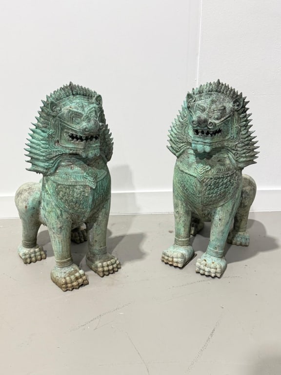 A pair of Chinese, Bronze, foo lion sculptures: A pair of Chinese, Bronze, foo lion garden sculptures Measures: 24 inches high x 18 inches wide x 17 inches deep Items location: 32 S Dixie Hwy, Lake Worth, FL 33460