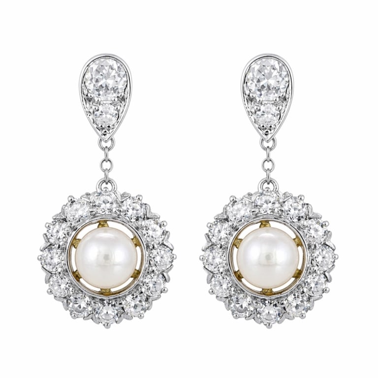 18K Gold & Platinum Pearl and Diamond Earrings: Item # 13926 Category Earrings Victorian 18K Yellow Gold & Platinum Natural Pearl and Diamond Earrings Weighing 5.3 grams Set with 2 Natural Pearls Along with 28 Old Mine Diamonds weighing app. 2.20