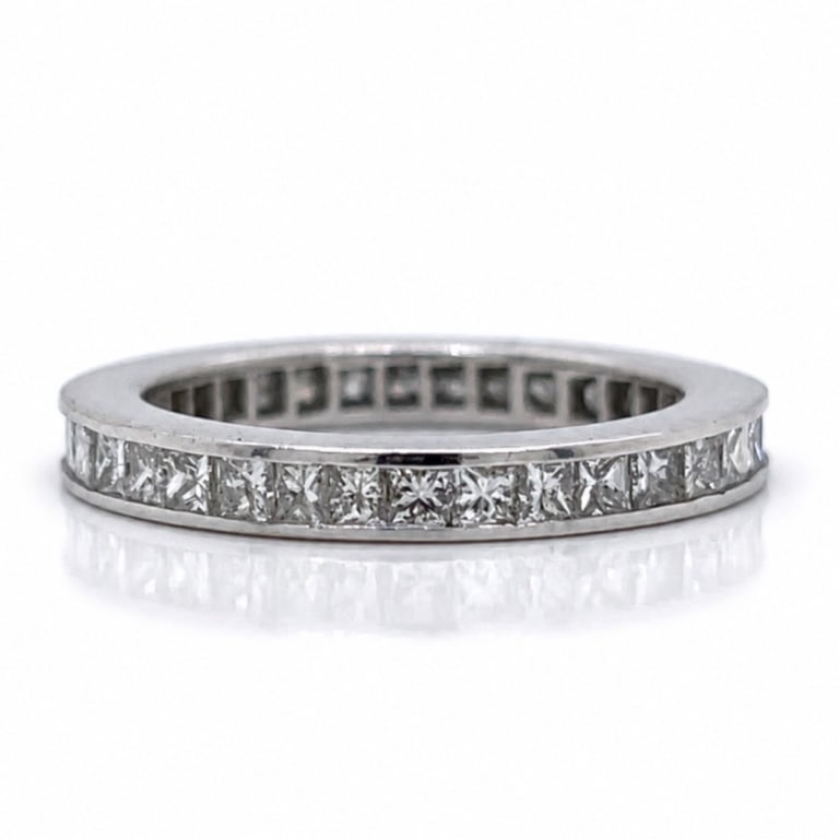 14K White Gold 1.95 Ct. Diamond Eternity Band: Item # 14070 Category Rings 14K White Gold 1.95 Ct. Diamond Eternity Band Weighing 5.1 grams Set with app. 1.95 Ct. of Princess-cut Diamonds H-I Color, VS1-VS2 Clarity Ring Size 6