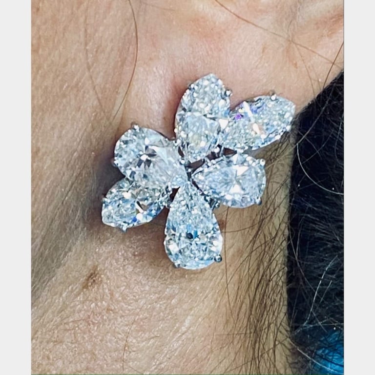 Platinum 15.01 Ct. Diamond Earrings: Item # 7189 Platinum 15.01 Ct. Diamond Earrings Weighing 11.5 grams Set with 6 Marquis Diamonds weighing 7.06 Ct. Along with 6 Pear-shaped Diamonds weighing 7.95 Ct. E-G Color, VVS-VS Clarity App. 1