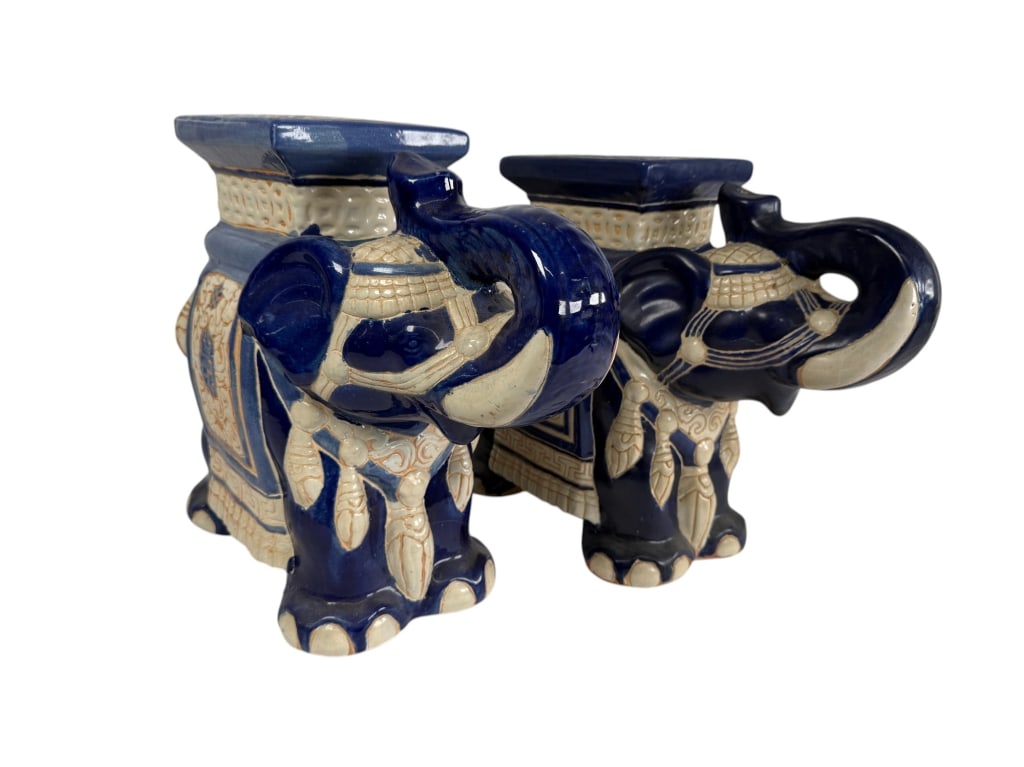 Pair Vintage Chinese Porcelain Elephant Pedestals: Pair Vintage Chinese Porcelain Elephant Pedestals. No make or marks. Both show signs of age and wear, minor discoloration present, otherwise in good condition. Larger elephant measures approx 14 5/8"