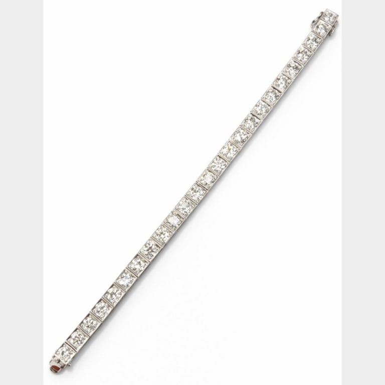 14.10 Ct. Diamond Tennis Bracelet: Item # 13753 Category Bracelets 18K White Gold & Platinum 14.10 Ct. Diamond Tennis Bracelet Weighing 30.7 grams Set with 26 European-cut Diamonds weighing app. 14.10 Ct. H-J Color, VS1-SI2 Clarity