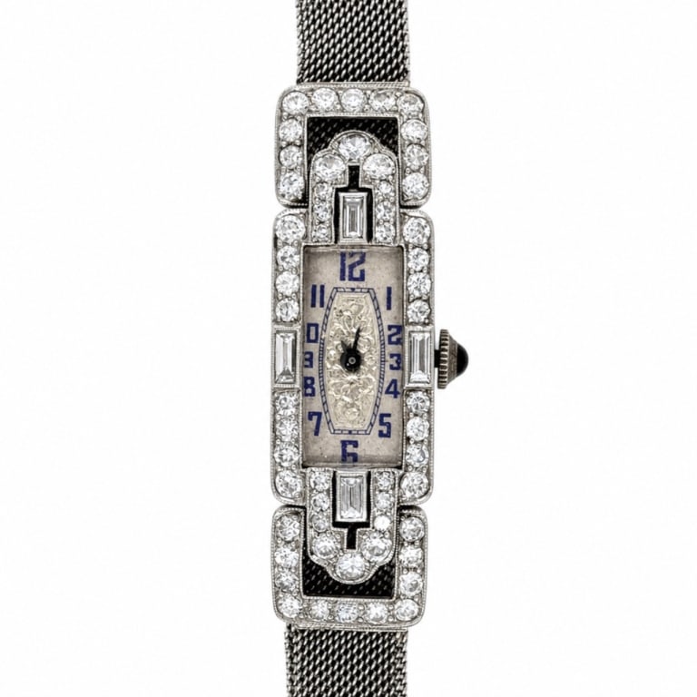 Art Deco Platinum Diamond Ladies Watch: Item # 14002 Category Watches Art Deco Platinum Diamond Ladies Watch Weighing 28.4 grams Set with 60 Diamonds weighing app. 3.50 Ct. G-H Color, VVS-VS Clarity Manual winding movement *All watches are 