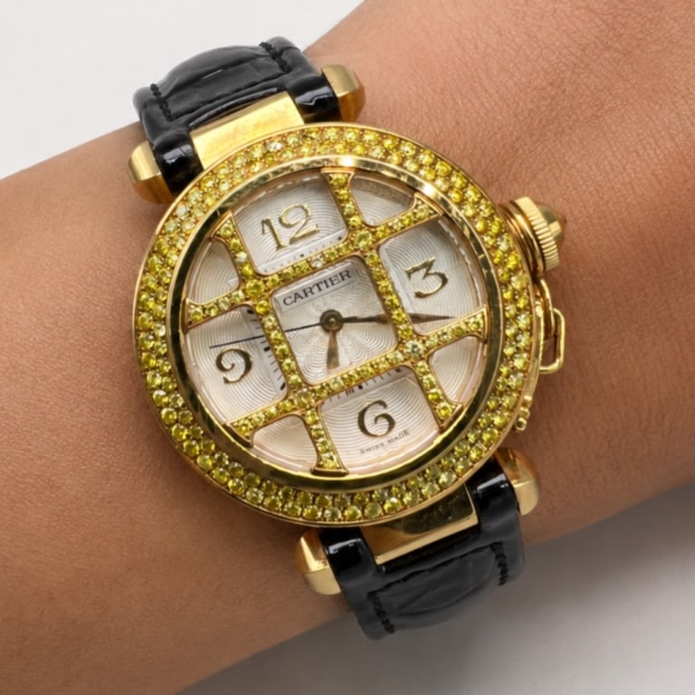 CARTIER 18K Gold Pasha 32mm Diamond Watch: Item # 14023 Category Watches CARTIER 18K Yellow Gold Pasha 32mm Fancy Yellow Diamond Watch Weighing 77.0 grams Set with all original fancy yellow diamond Bezel & Grill All original band & deployment 