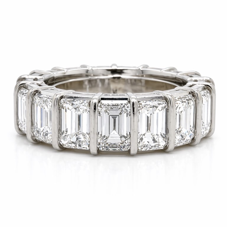 Platinum 7.65 Ct. Diamond Eternity Band: Platinum 7.65 Ct. Diamond Eternity Band Item # 13930 Category Rings Platinum 7.65 Ct. Diamond Eternity Band Weighing 9.9 grams Set with 17 Emerald-cut Diamonds weighing app. 7.65 Ct. H-I Color,