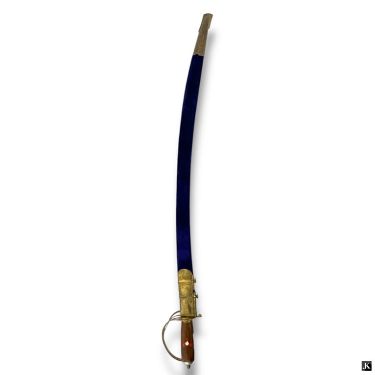Vintage Made in India Sword: Vintage Made in India Sword. Blue velvet sheath. Wood handle Marked on blade. Good vintage condition. Measures 36" L. 33121 2A/LR