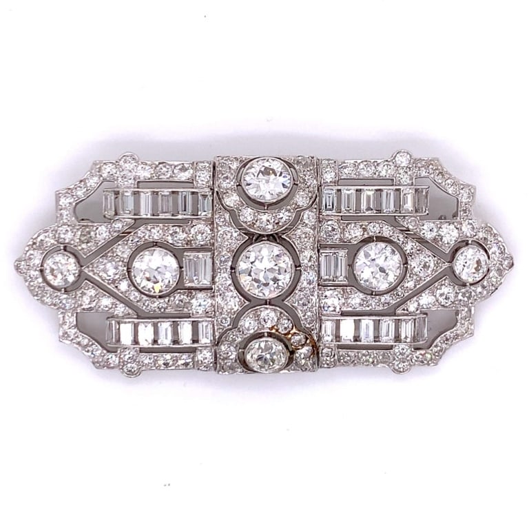 14.55 Ct Diamond Brooch: 14.55 Ct Diamond Brooch Item # 6537 Category Pins - Clips Platinum Art Deco Diamond Brooch Weighing 24.6 grams Set with 7 Old European Diamonds weighing app. 6.05 Ct. Along with 28 Baguette Diamonds