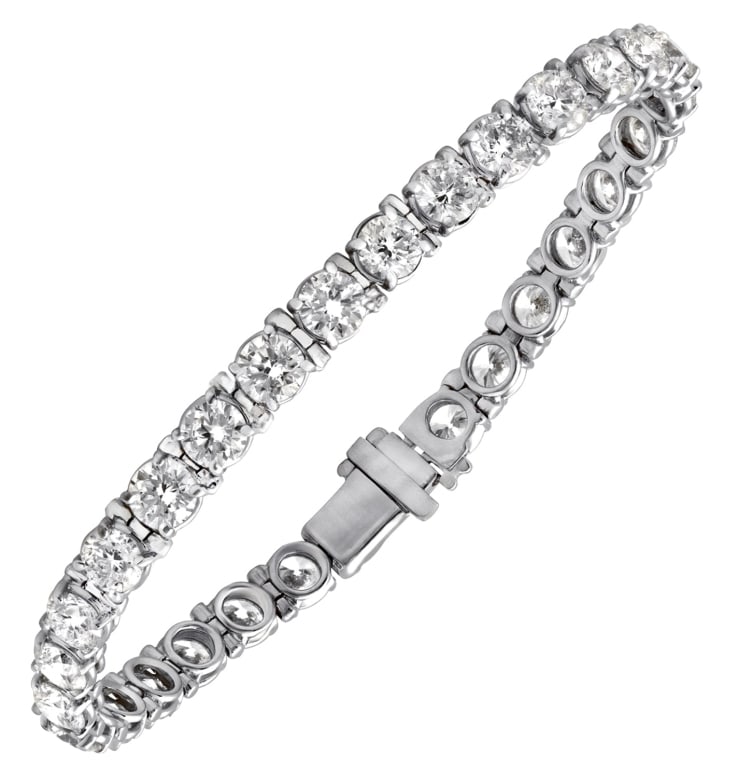 12 Carat Diamond Tennis Bracelet: 12 Carat Diamond Tennis Bracelet SKU: 42926-1 Metal: 14k White Gold Stones: Diamonds Diamond Shape: Round Brilliant Diamond Count: 30 Total Diamond Weight: 12 carats Total Weight: 14.9 g