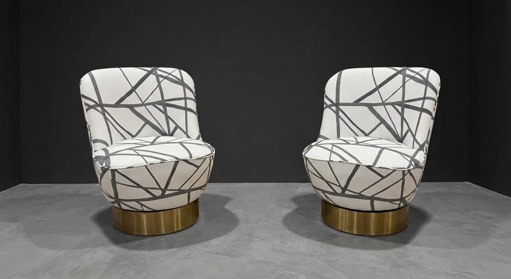 Pair of brass swivel chairs/Kelly Wearstler fabric: Pair of brass swivel chairs upholstered in Kelly Wearstler channels fabric. LOCATION & SHIPPING: This item is located at our West Los Angeles (West LA) location. Local pickup will be from West LA,