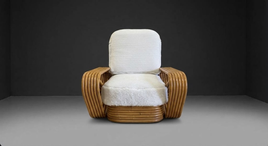 Paul Frankl pretzel chair: 1940s Mid-Century Modern "Square Pretzel" rattan lounge chair, originally designed by the legendary Paul Frankl, upholstered in cream Shearling. LOCATION & SHIPPING: This item is located at our West L
