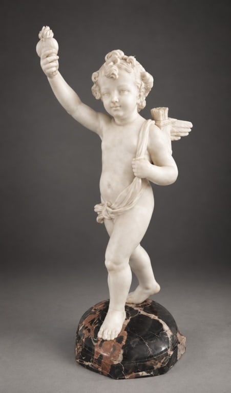Donatello Gabbrielli "Cupid Holding Flaming Heart": Donatello Gabbrielli (Italian, 1884-1955) Cupid Holding Flaming Heart Aloft. The main figure is masterfully carved out of white Carrara marble. It stands atop a highly figured, multi-colored dark