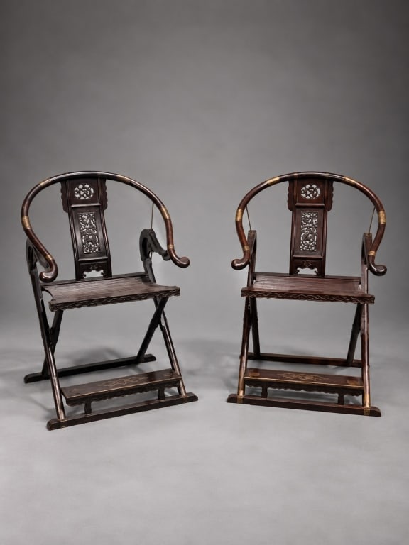 Classical Chinese folding horseshoe-back armchairs: Classical Chinese folding horseshoe-back armchairs, historically known as Jiaoyi Measurements: 44" H x 28 1/2" W x 23" D