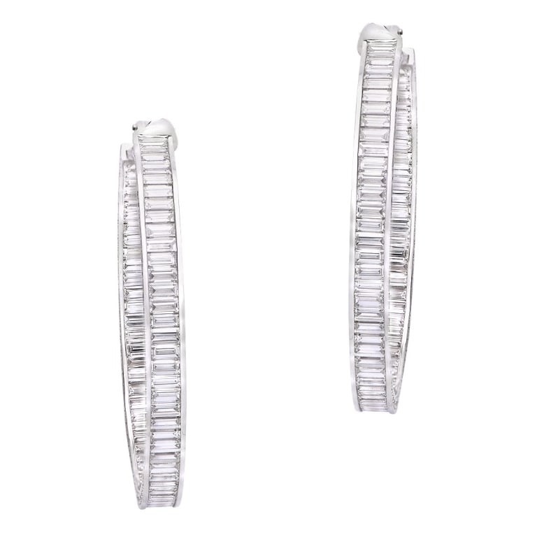 32ct Diamond Hoops: 32ct Diamond Hoops SKU: 52597 Metal: 18k White Gold Total Diamond Weight: 32 carats Total Weight: 29.7 grams Measurements: 61mm x 53mm