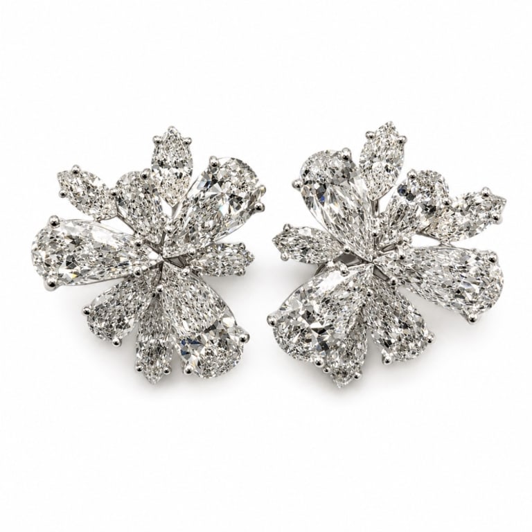 Platinum 23.00 Ct. Diamond Cluster Earrings: Platinum 23.00 Ct. Diamond Cluster Earrings Item # 14230 Category Earrings Platinum 23.00 Ct. Diamond Cluster Earrings Weighing 16.2 grams Set with 6 Diamonds weighing app. 14.00 Ct. Along with 12 Dia