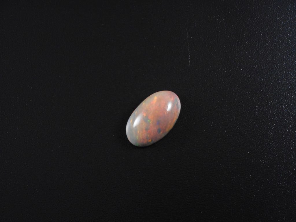 Ethiopian 4.45ct black opal cabochon (1 of 2)