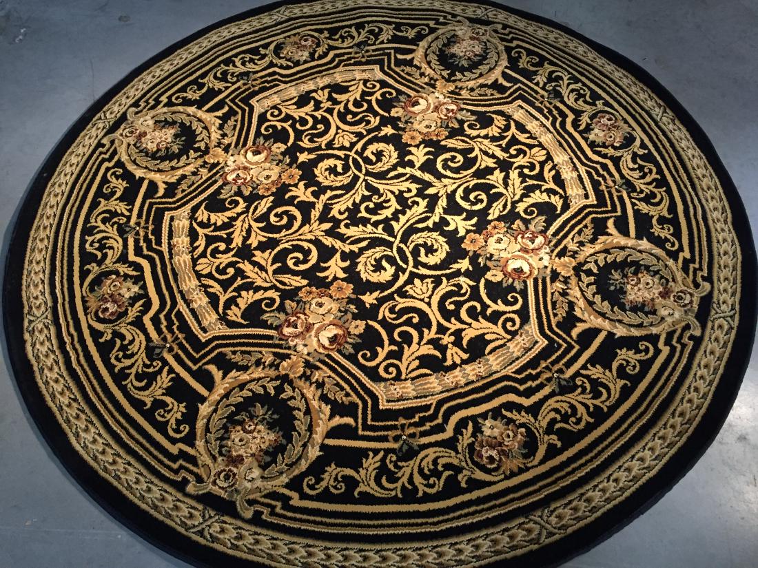 STUNNING FRENCH AUBOSSON DESIGN ROUND RUG 5'.3"X5'.3": 5'.3"X5.3" Top of line Belgium made Brand name Round rug, in French Aubosson pattern Premium quality 1.0 M PPSM dense pile black , gold , and multi accent colors ,Made of durable and easy to care, pol