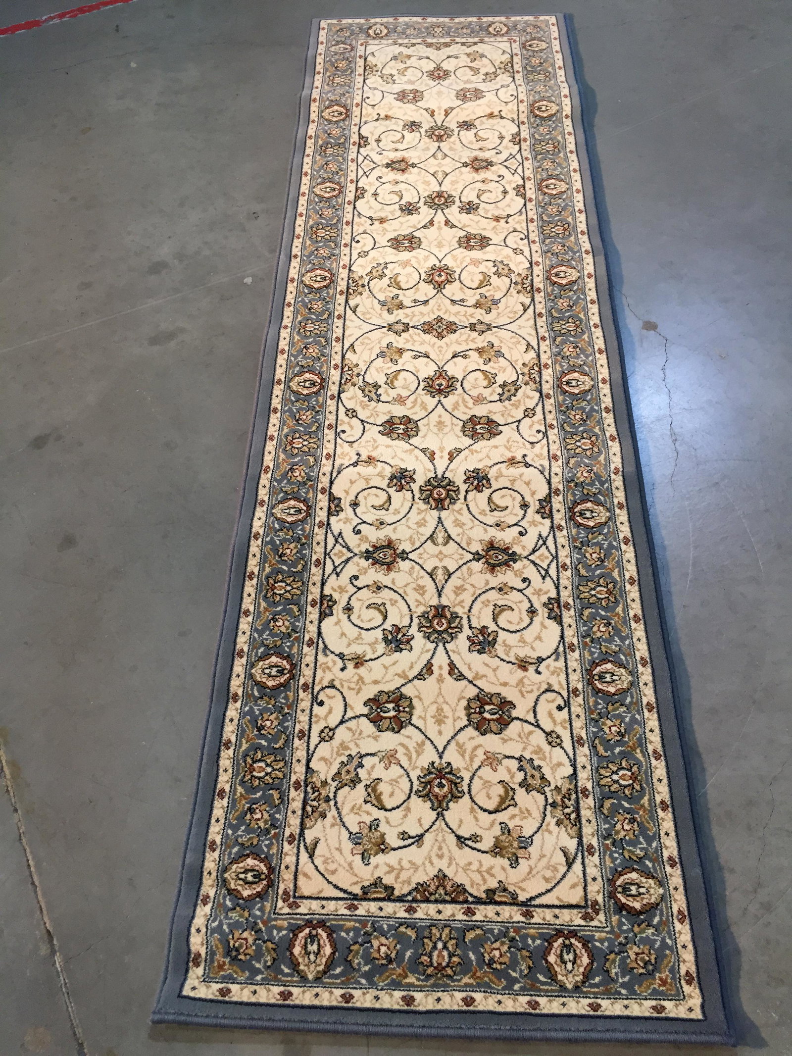 BELGIUM MADE CLASSIC RUNNER 11 Ft: 2'.3"X7'.7" Classic Turkish Oushak design runner , Belgium Brand name rug, in Ivory, royal blue and multi accent colors ,Made of durable and easy to care, polyproplyen pile power loomed in Belgium