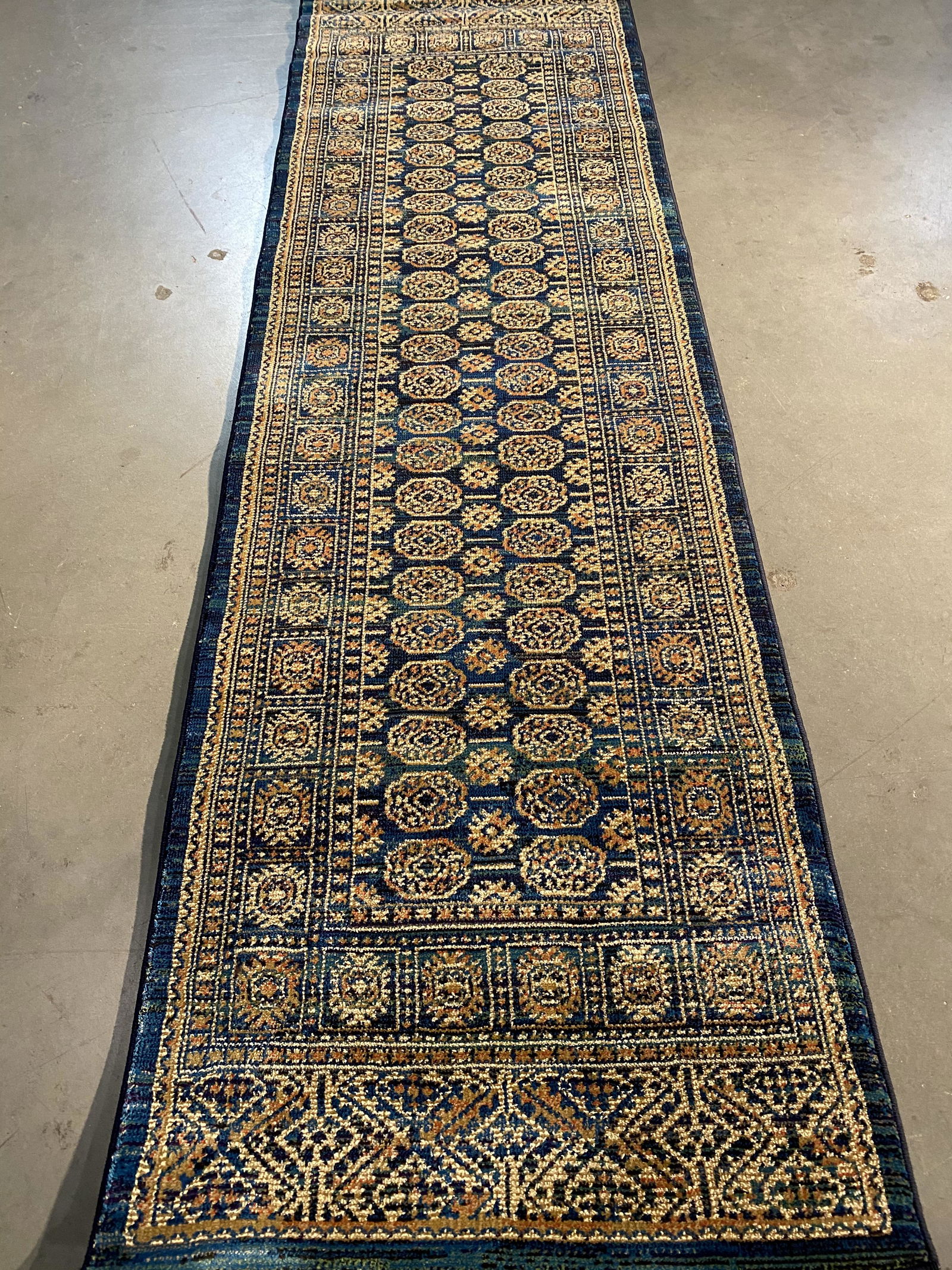STUNNING MODERN BOKHARA RUNNER 8 FT: 2'.3"x7'.7" Modern design Bokhara runner decorative Midnight blue, gold colors ,Made of durable and easy to care, polyproplyen and Bamboo silk pile power loom in Turkey