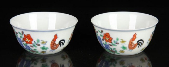 EXCEPTIONALLY IMPORTANT PAIR DOUCAI CHICKEN CUP, MARKED: arguably the most celebrated porcelain throughout the centuries, delicately potted with flawless translucent sides flaring out from the countersunk base to a subtly everted rim, the exterior painted i