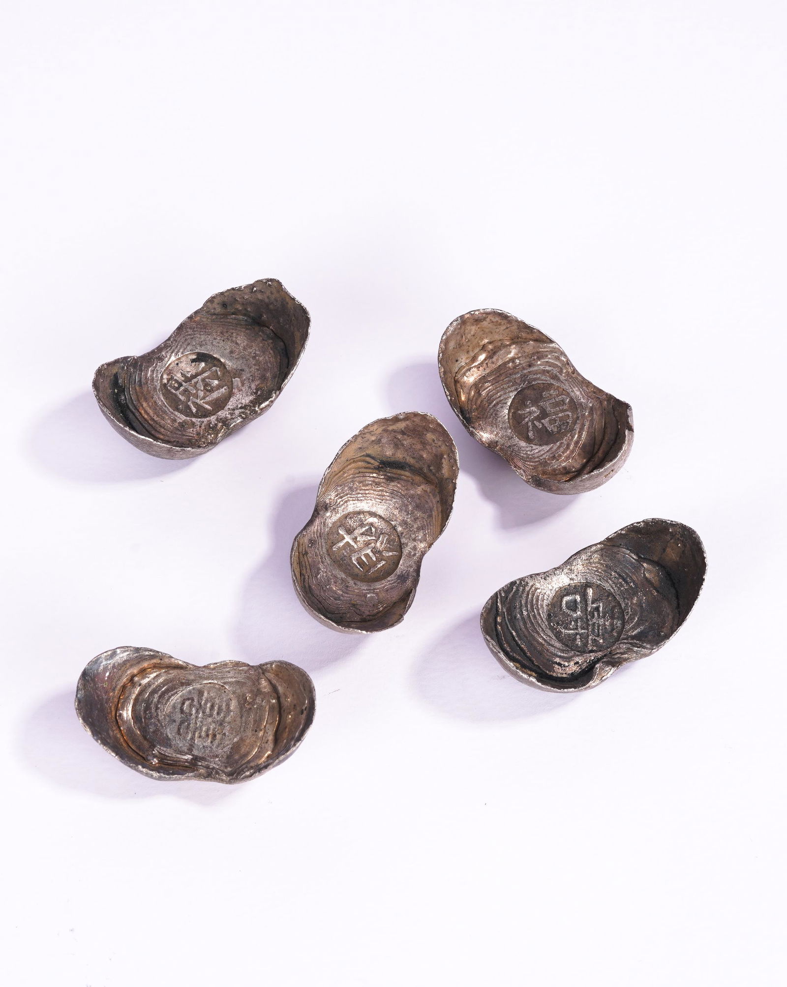 A Group of Five Chinese Silver Ingots (1 of 6)