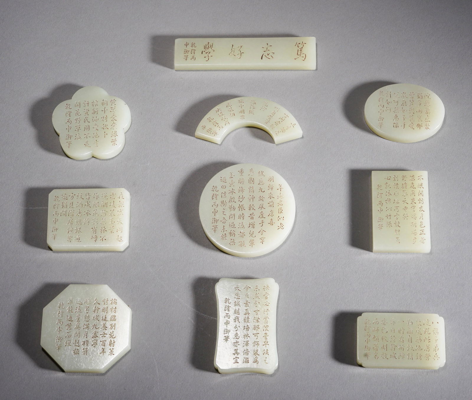 Chinese Antique white jade poetry Carvings Set: Chinese Antique white jade poetry Carvings Set Chinese Antique white jade poetry carvings, front in Chinese and back in Manchurian. Length Largest 9.5 cm