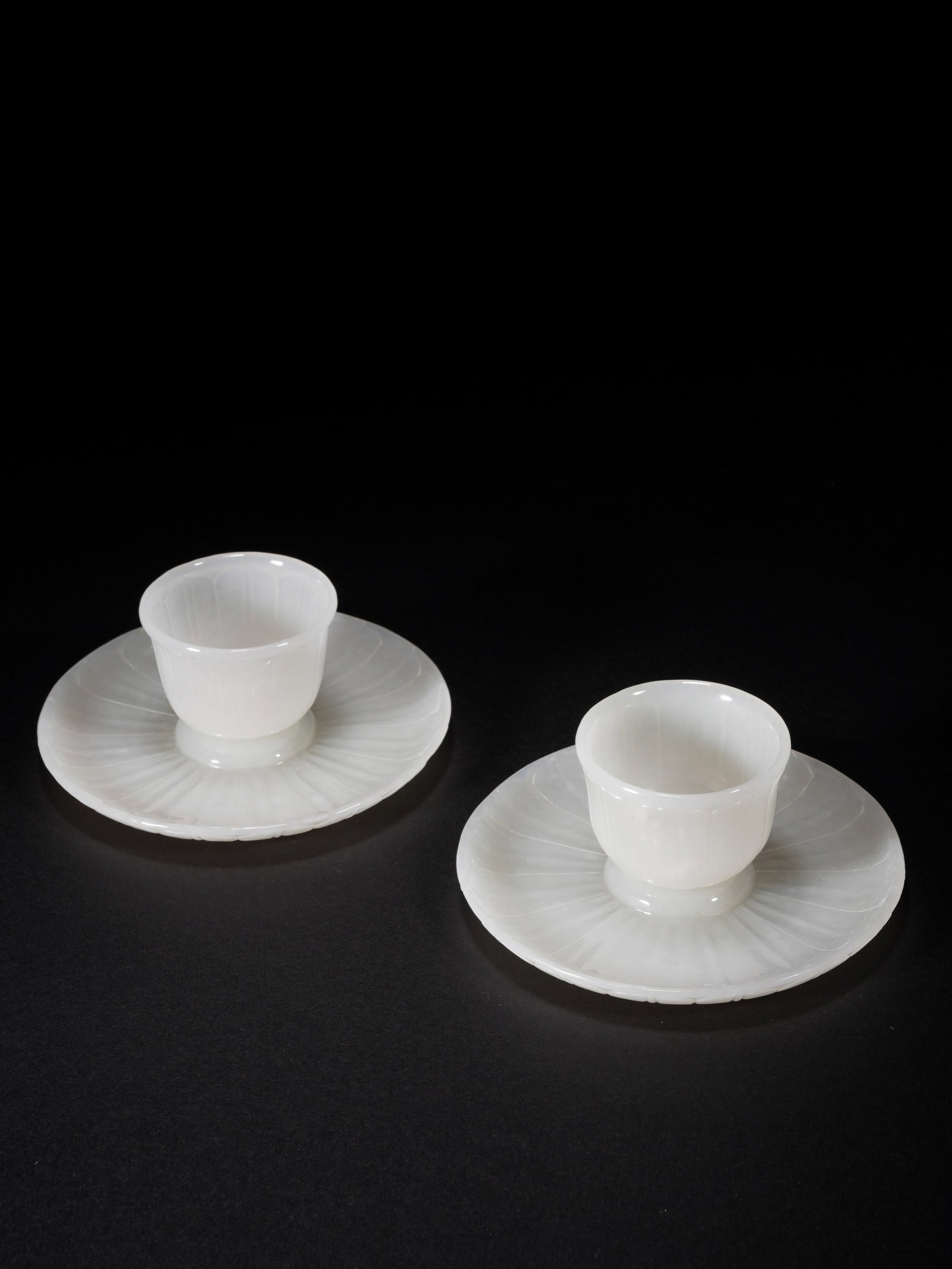 A Pair Of Mughal Style White Jade Cups: A Pair Of Mughal Style White Jade Cups A Pair Of Mughal Style White Jade Cups Cup: 4.8x3.5 Plate: 0.3x1 overall:H4.3cm