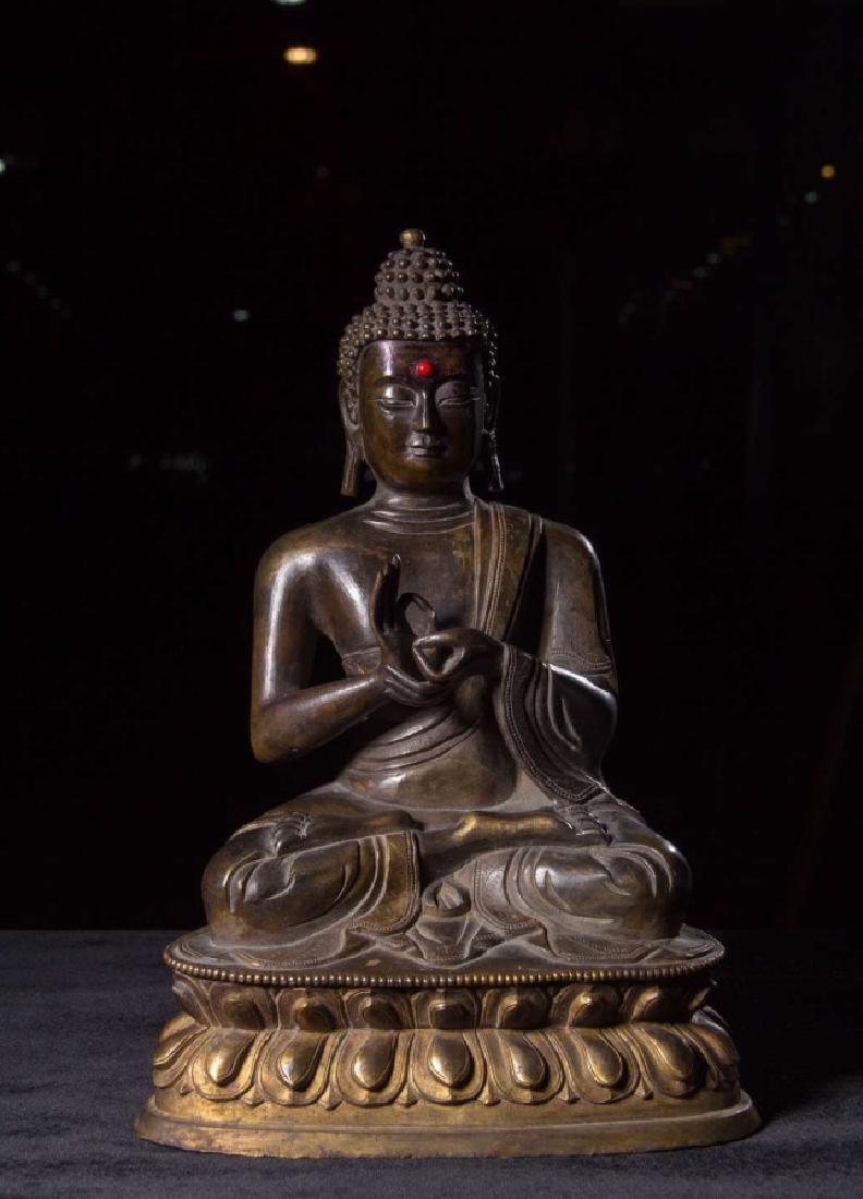 A GILT-BRONZE FIGURE OF BUDDHA (1 of 8)