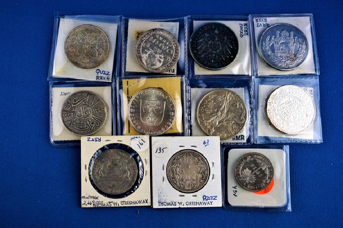 (11) ASSORTED FORGEIN COINS: 1913 British W. AFR. 2 shillings; 1918 Morocco 10 Dirhams .900 silver Paris; 1903-1905 Tibel 1 Rupee .935 silver Horizontal Rosette; 1932 Iraq Riyah; 1860 Germany Saxony Thaler .900 silver; 1935 Swede