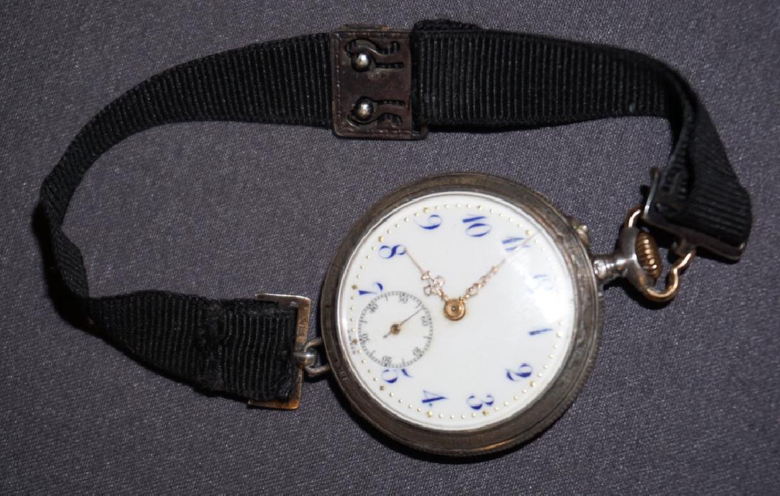 ANTIQUE NARCISSE WOMANS WRIST/POCKET WATCH: This is a Swiss made pocket watch manufactured by Narcisse Clock Company. The case and movement of the watch are sterling silver, and the hands are gold. On the movement, it reads ?Ten Jewels, Two Adj
