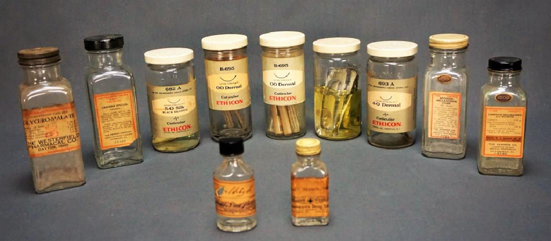 (11) VINTAGE MEDICINAL BOTTLES (1 of 8)