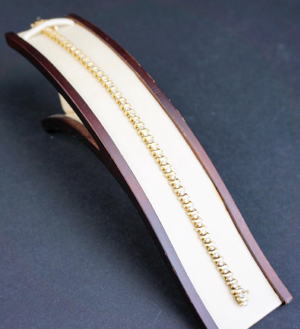 14K GOLD AND DIAMOND TENNIS BRACELET (1 of 4)