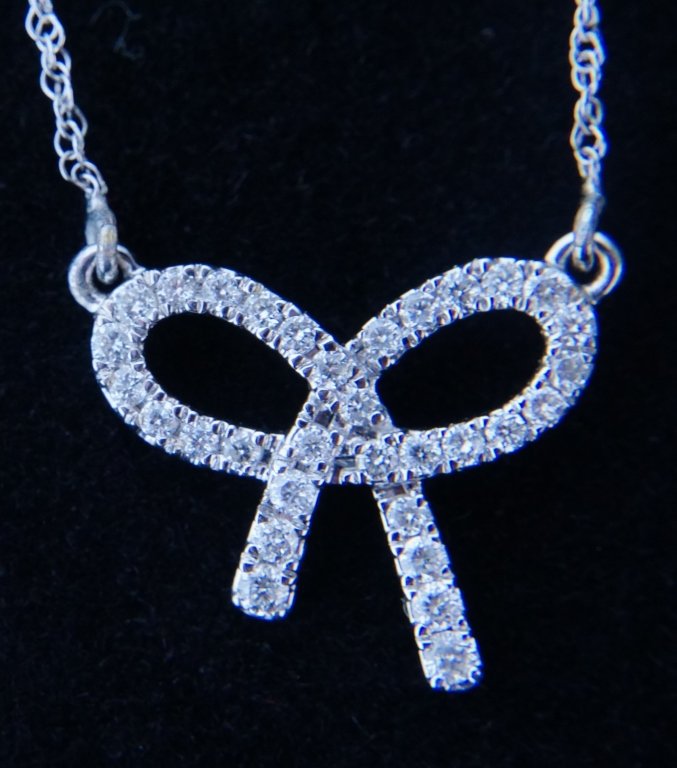 10K GOLD INFINITY PENDANT ON CHAIN (1 of 2)