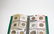 44 ASSORTED FOREIGN COINS IN COIN STOCK BOOK - 2